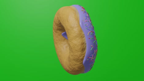 deliciosa rosquilla dulce girando en la llave de croma. rosquilla salpicada brillante y colorida girando en un fondo verde.