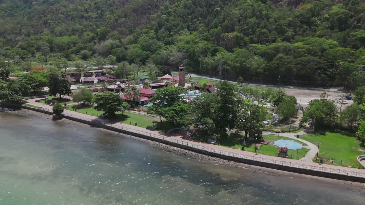 A drone captures an aerial view of the Chaguaramas boardwalk and Williams Bay on the island of Trinidad in the Caribbean.