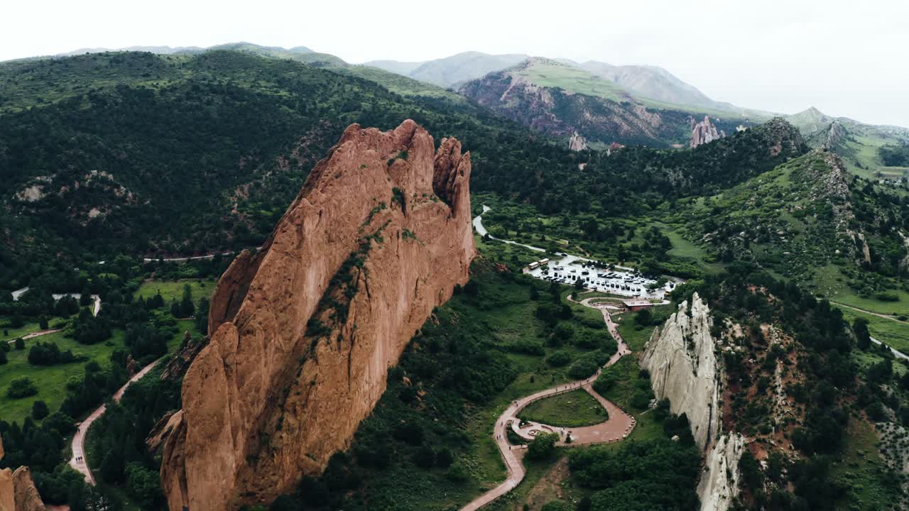 Drone shot pushing towards Garden of the Gods' unique rock formation