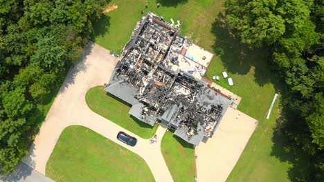 aerial overhead footage of a recently burnt down house