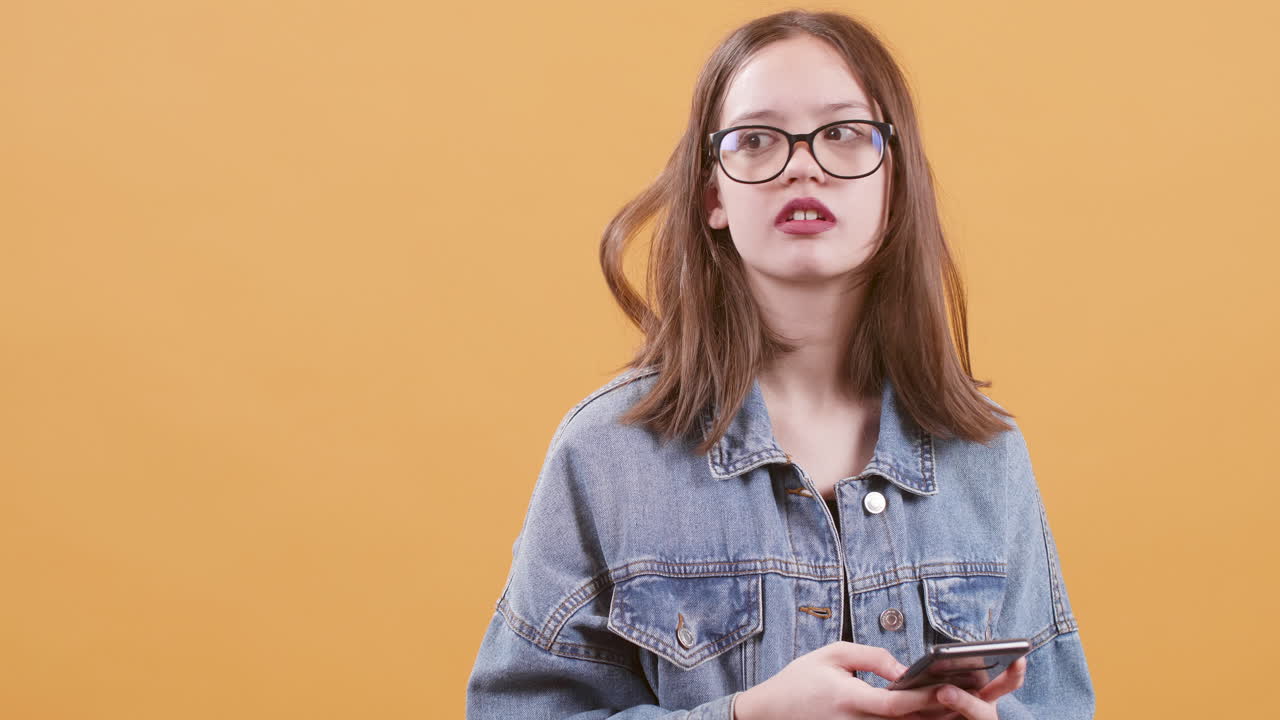 Teenage girl using smartphone
