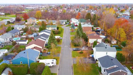 small living homes of canada township in autumn, aerial view