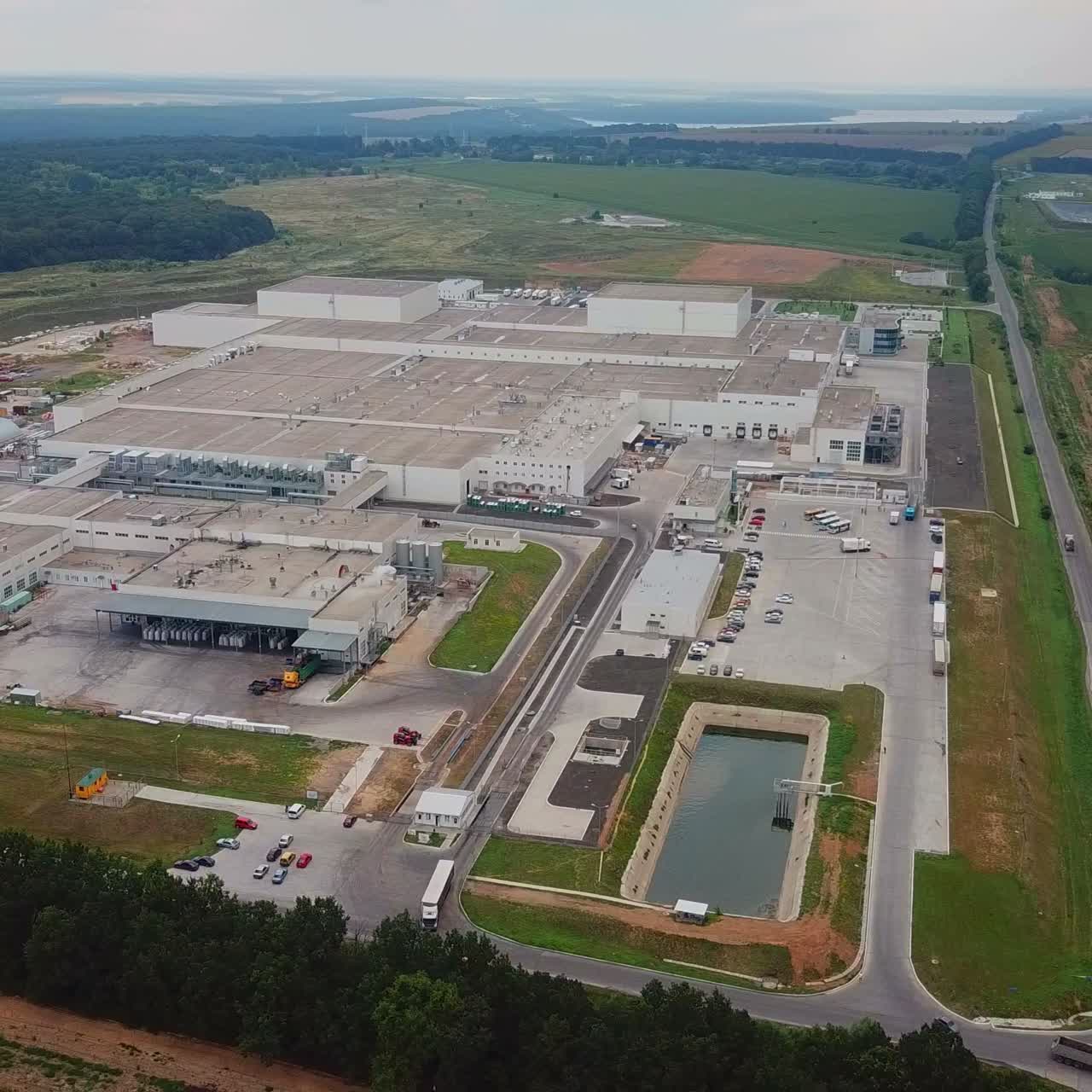 Aerial footage of a large industrial complex. Territory industrial factory. Manufacturing plant