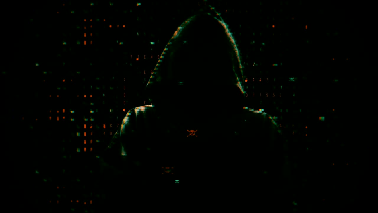 silueta verde de un hacker