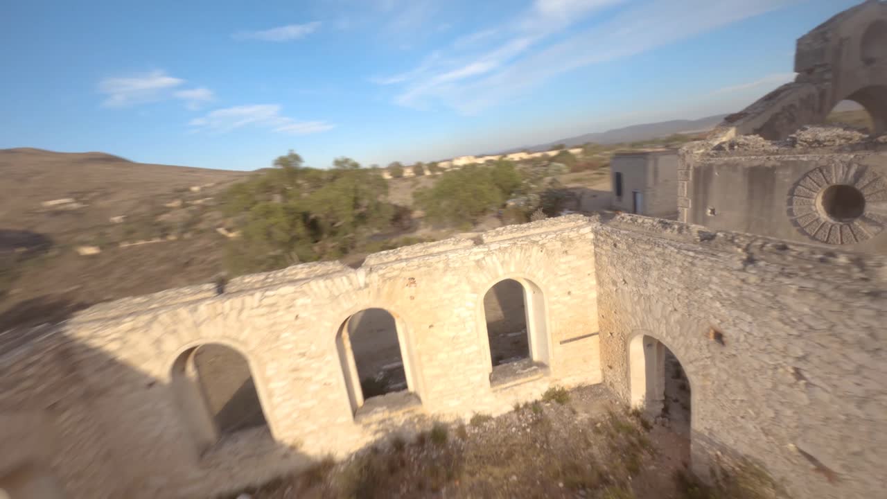 Revealing an old abandoned Mexican hacienda in the setting sun.