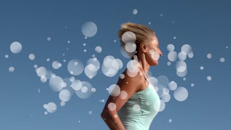 woman running surrounded by white bubbles effect