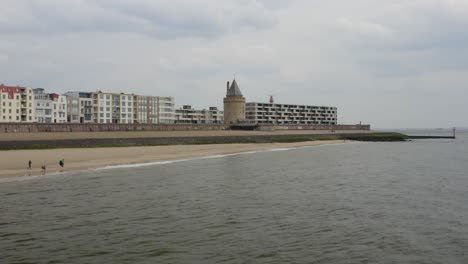 aerial approach to the 16th-century prison tower gevangentoren, a part of the former vlissingen city gate in zeeland, the netherlands