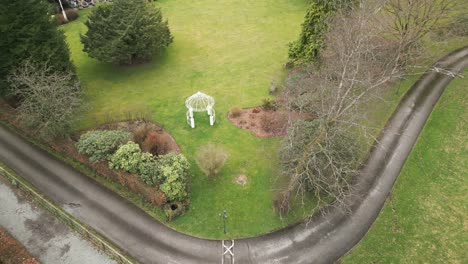 Ornate-Gazebo-Structure-On-Garden-Lawn-In-Grasmere,-Lake-District,-UK