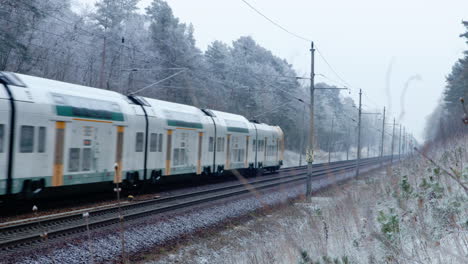 east german train line with modern public transportation system during winter