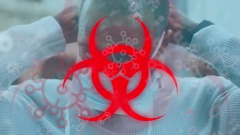 animación de señales de peligro biológico y células de virus sobre un hombre que lleva una máscara facial