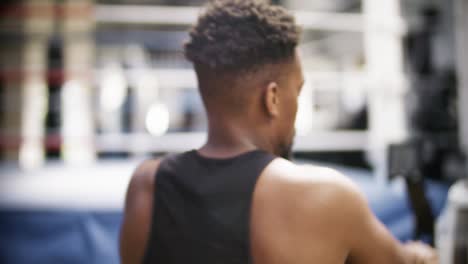 man rowing in gym