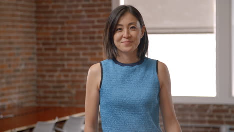 Portrait-Of-Businesswoman-In-Office-Shot-In-Slow-Motion