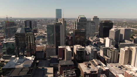 Aerial-shot-rising-upwards-over-downtown-Nashville,-Tennessee-on-a-clear,-fall-day