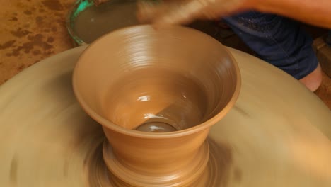 potter at work makes ceramic dishes. india, rajasthan.