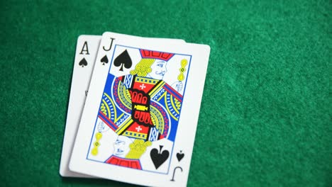 two playing cards on poker table in casino 4k