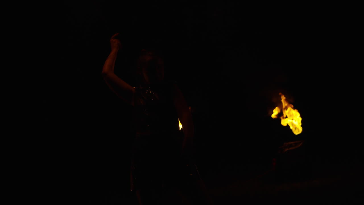 Fire Dancer Performance at Night