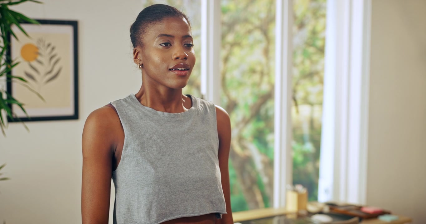 Young Woman Practicing Mindfulness and Deep Breathing at Home