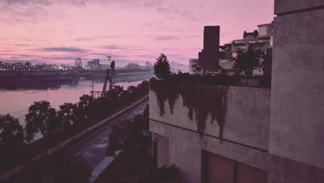 balcony overlooking river with table and chairs