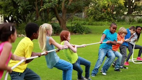 Cute-pupils-having-a-tug-of-war