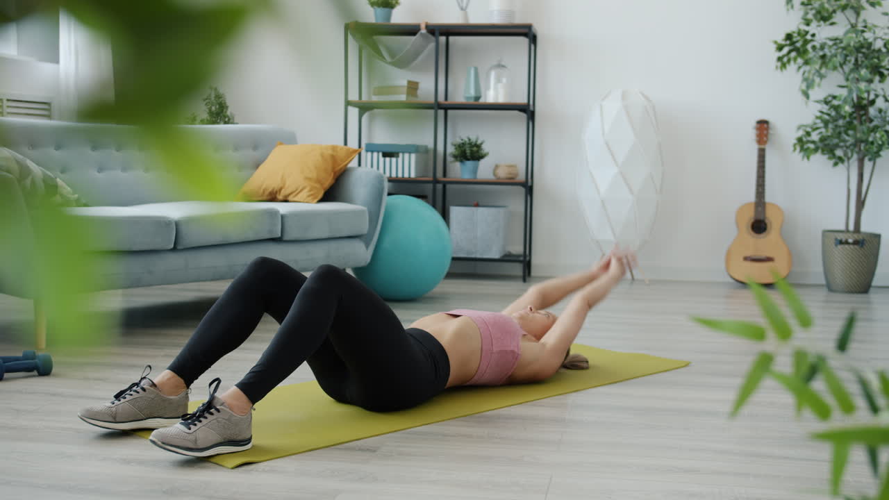 Woman Doing Abs Workout at Home