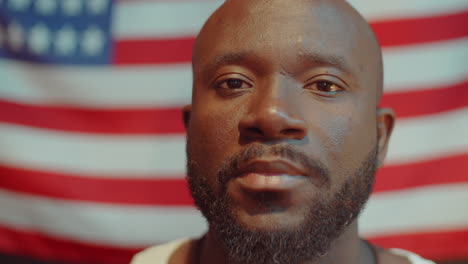 portrait of african american man on us flag