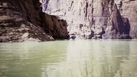 exploring rugged cliffs and calm waters of a serene river canyon landscape