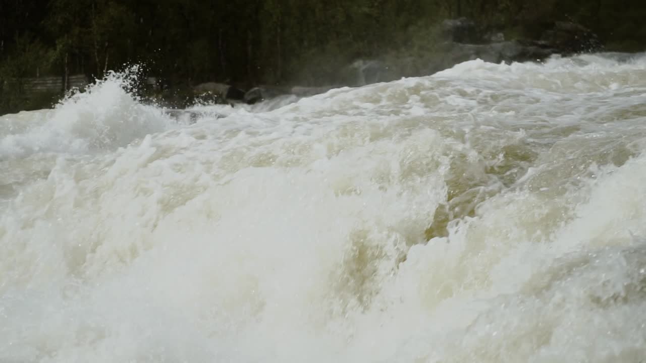 River rapids and water falls in slow motion