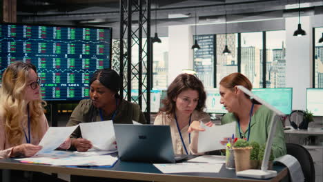 vertical video diverse group of women uniting for new strategy and exchange data insights