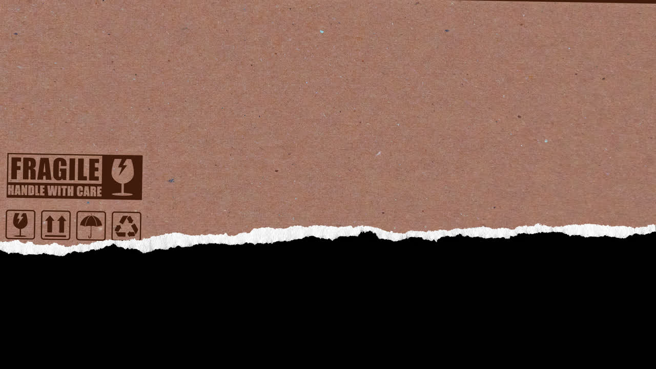 Cardboard Box with Fragile Label Tearing to Reveal Black Background