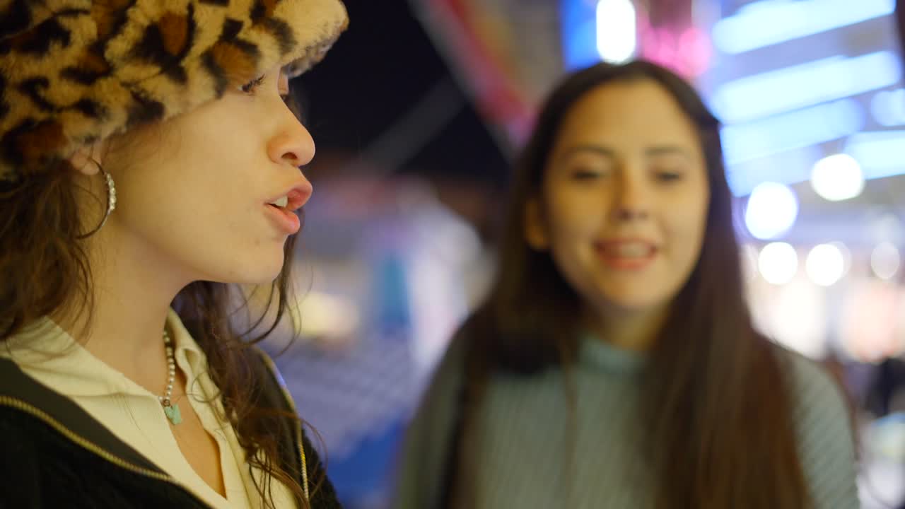 Two women out at night