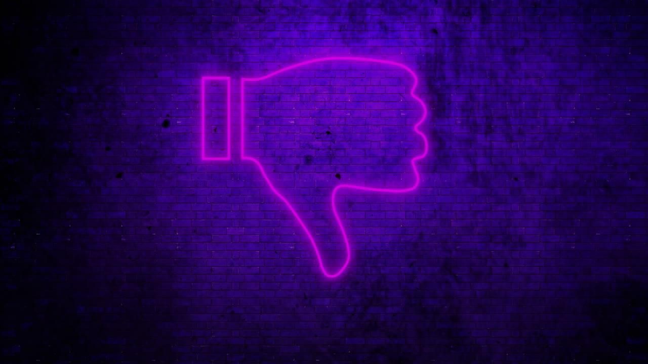 pulgares hacia abajo signo de neón en la pared de ladrillo 4k