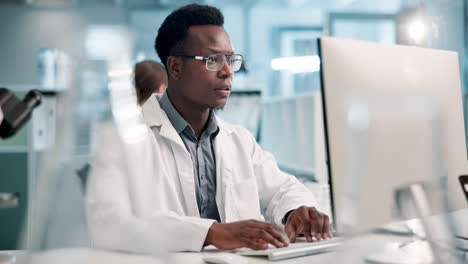 Stressed Scientist Working on Computer