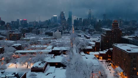 snowy cityscape at night