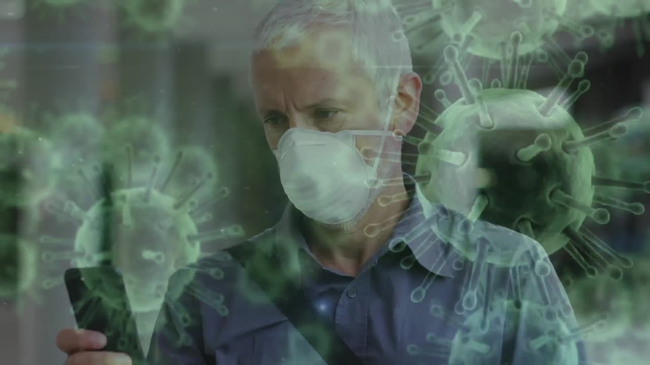 코로나19 세포가 얼굴 마스크를 쓰고 있는 사람을 가로질러 움직이는 애니메이션