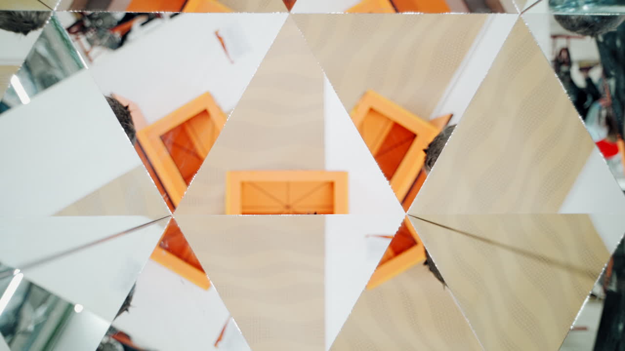 Child in a kaleidoscope tunnel. Glance into infinity. Museum of Science