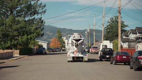 concrete mixing truck driving away