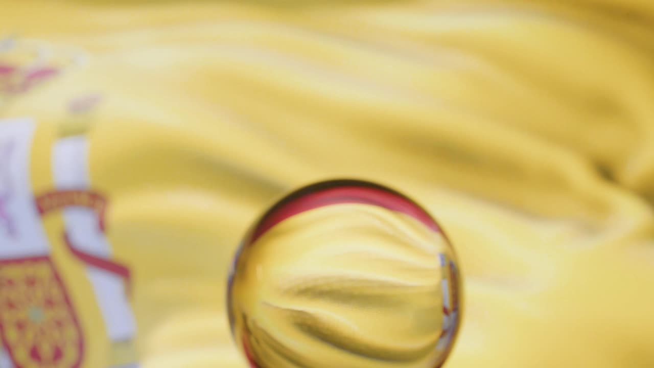 Spanish Flag is Waving Against Blue Sky in 4K