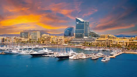 luxury yachts in barcelona marina at sunset