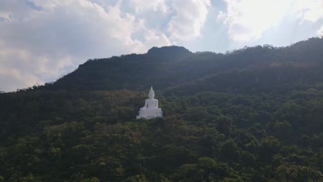 luang por khao, wat theppitak punnaram, a 4k footage towards this landmark of a giant white buddha statue in pak chong, thailand