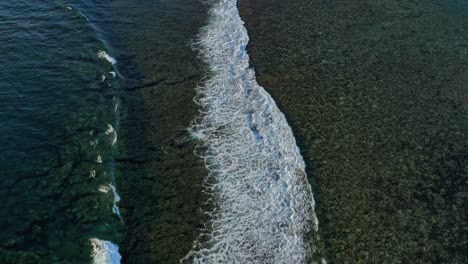 Ocean-Waves-of-Mauritius-Indian-Ocean,-Aerial-Drone-Top-Notch-Above-Water-Coast-Shore-and-Skyline