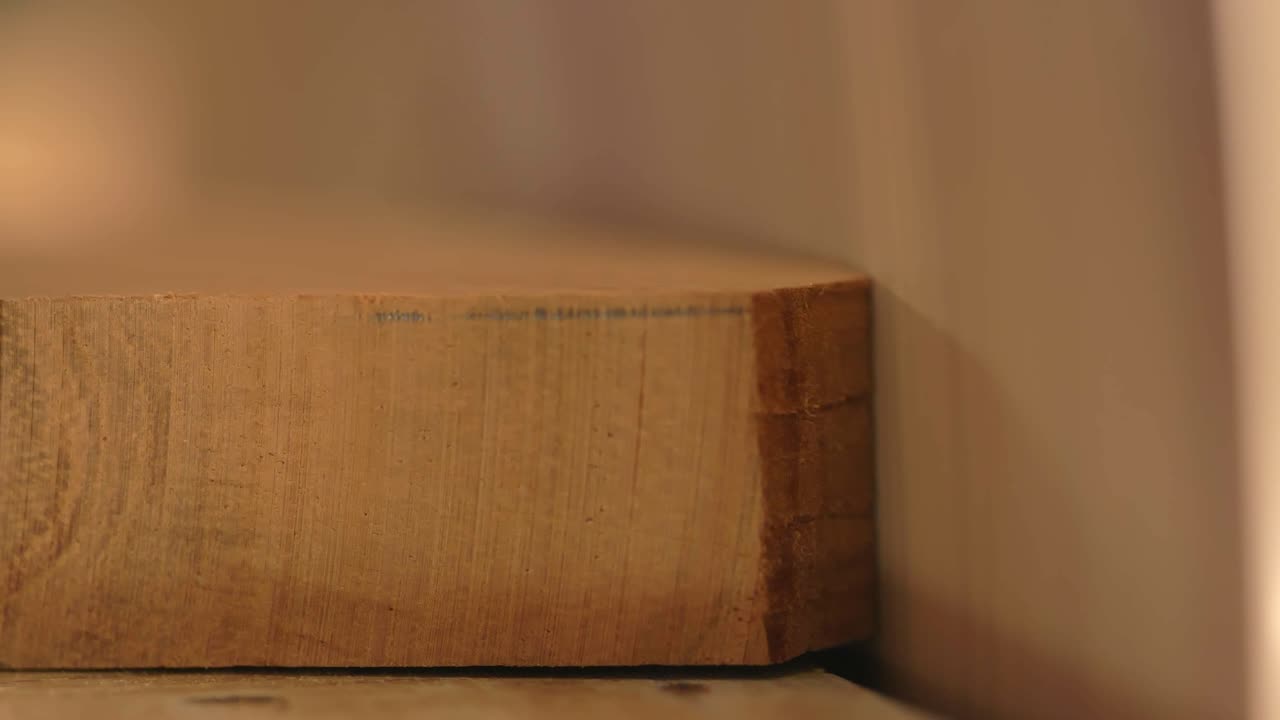 Macro Shot Of Woodworker Sanding Wood In A Furniture Woodworking Manufacturing Shop