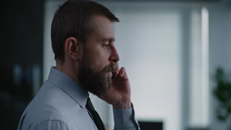 businessman on phone call in office