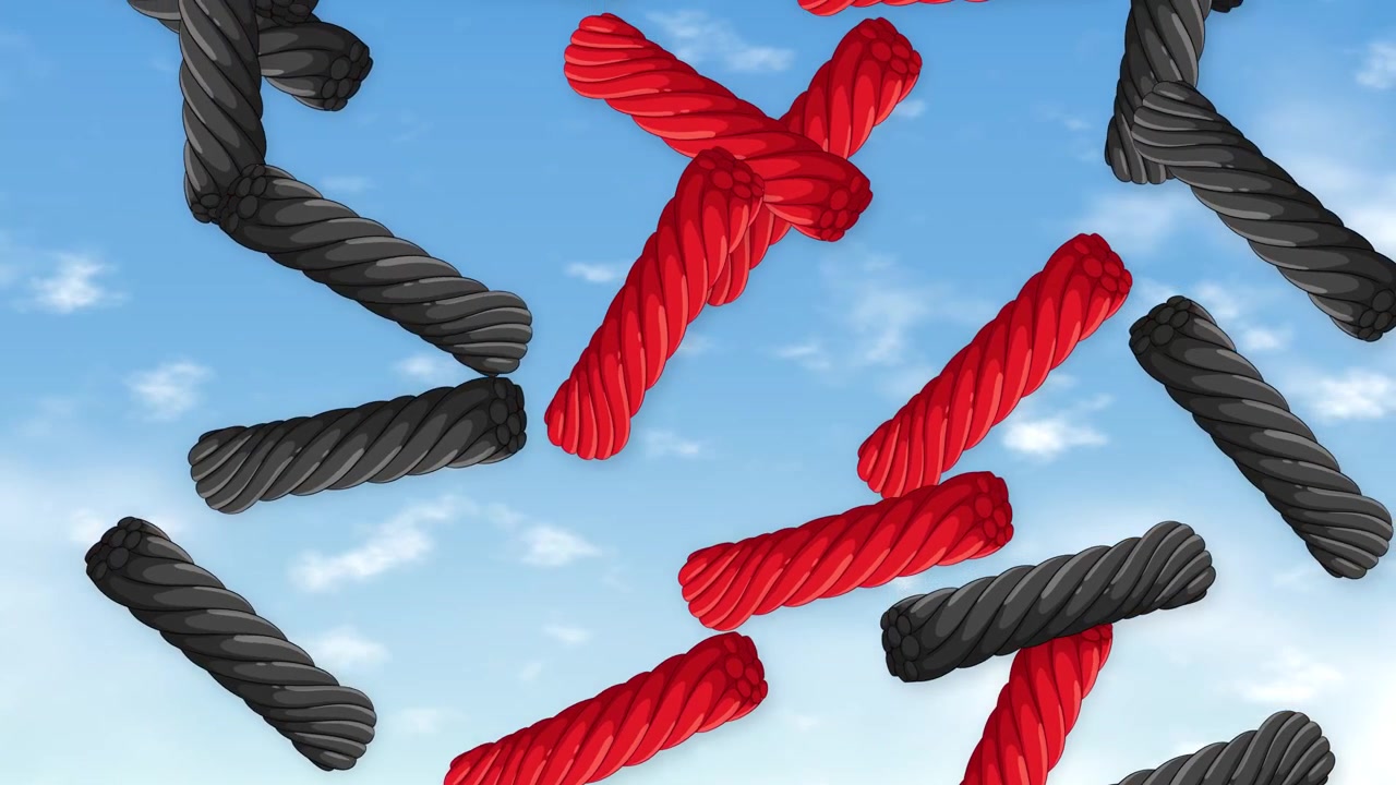 Red and black licorice candy twists fall and tumble against a bright blue sky background.