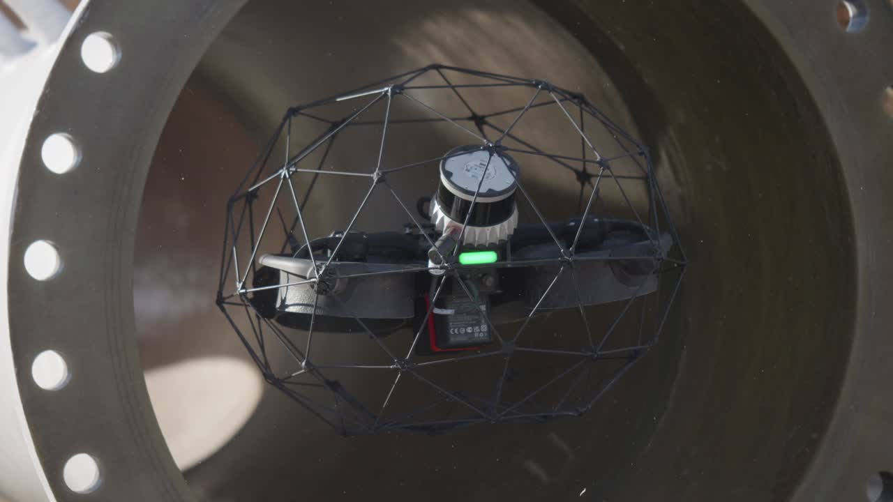 Industrial drone camera visually inspects confined pipe interior