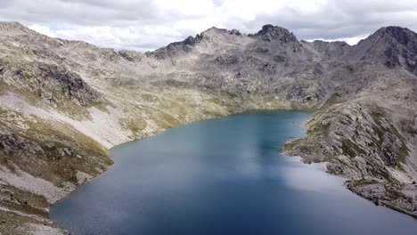 brazato lake at spanish pyrenees, panticosa, huesca, aragon, spain - aerial drone view