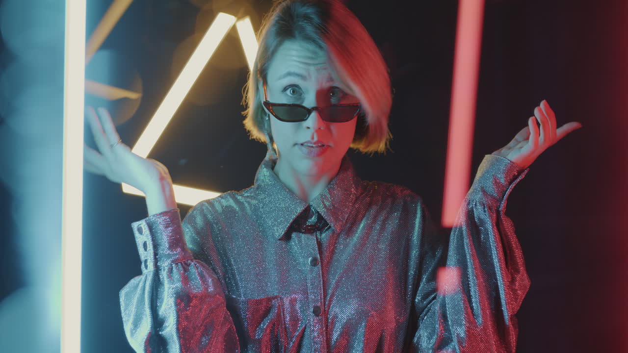 Trendy Woman Posing with Neon Lights