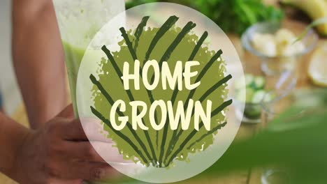 Animation-of-home-grown-text-over-hand-making-healthy-drink