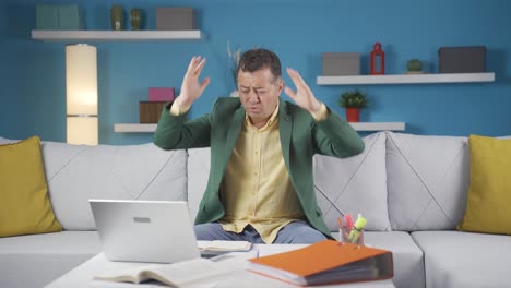 home office worker man thinking worriedly.