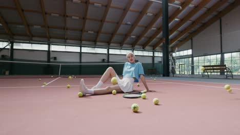 woman posing on a tennis court