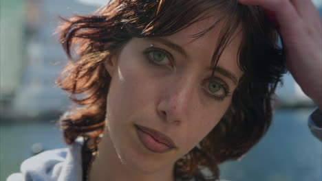 outdoor fashion portrait of young alternative style woman with tattoos and piercing at canary wharf in london docklands shot in real time 6